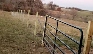 We specialize in professional gate installation and repair services to enhance your property's security and aesthetics. Trust our experienced team to provide quality workmanship that will exceed your expectations. for Black Sheep Fencing LLC  in Odessa, MO 