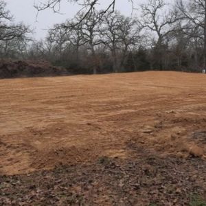 Enhance your property's landscape with our expert land grading service, ensuring proper drainage and a smooth foundation for future projects. Our team guarantees precision, safety, and satisfaction in transforming your outdoor space. for La Fountain Tree Service in Louisville, KY