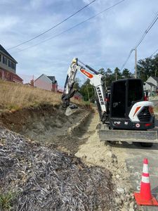 Our Excavation service ensures precise, safe excavation for your home or commercial project, creating a stable base while minimizing disruption and adhering to local building codes for peace of mind and structural integrity. for Staruk Trucking & Excavation Inc. in Uxbridge, MA