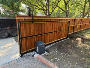 Enhance your home's security and convenience with our Automatic Drive Gates service, providing seamless operation, durable materials, and expert installation for a safe and stylish property entrance solution. for Ansley Staining and Exterior Works in New Braunfels, TX