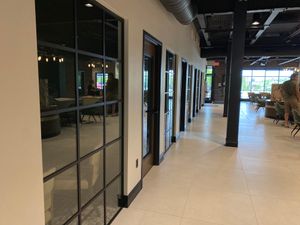 Elevate your workspace with sleek commercial glass partitions, doors & walls — modern, professional, and effortlessly elegant. Make the right impression every time! for Reed City Glass Enterprises in Reed City,  MI