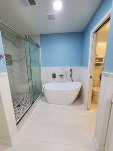 Transform your bathroom into a modern oasis with our expert renovation services, offering customized designs, quality materials, and meticulous craftsmanship to enhance beauty and functionality tailored to your unique style. for Big Brother Builders Construction in Houston, TX