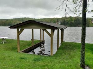 Our Boat Docks service provides custom docks designed and built to your specifications, perfect for creating a beautiful waterfront getaway. for Ins & Outs Home Repair, LLC in Madison County, IL