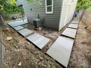 Our Concrete Services provide homeowners with professional and reliable solutions for all their concrete needs, including patios, driveways, walkways, and retaining walls. for Dove Springs Landscaping Services in Austin, Texas