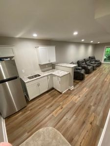 Our Kitchen Renovation service offers homeowners the opportunity to transform their kitchen into a beautiful and functional space through our expert construction and remodeling solutions. for Top Tier Construction in Madison Heights, VA