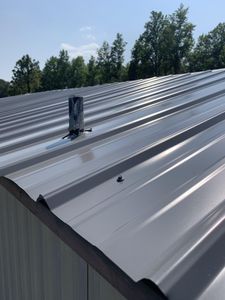 Our residential metal roofing master ribs service offers durable and stylish metal roofs for homeowners seeking long-lasting protection and an attractive appearance for their homes. for Safe Roofing Inc in Jacksonville, NC