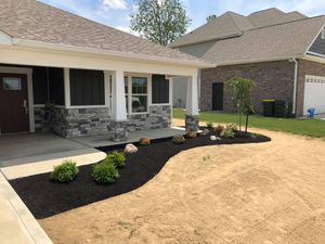 Our Mulch Installation service provides a layer of protection for your plants and helps to maintain moisture levels in the soil. We can install mulch in any color you choose to enhance your landscape design. for Showplace Lawncare & Landscaping, Inc. in Pendleton , IN