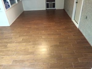 Our Flooring service offers professional and reliable installation of top-quality flooring materials to enhance the aesthetic appeal and functionality of your home. for D L Construction  in Ballinger, TX