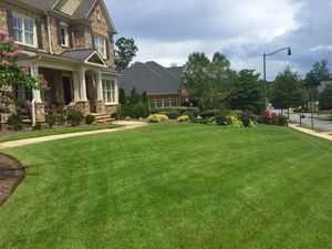 Our professional mowing service offers homeowners a hassle-free solution for maintaining their lawn, ensuring a well-manicured and pristine outdoor space. for Vivid Color Landscapes, LLC in Woodstock, GA