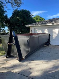 Our 15 Yard Dumpster rental service is perfect for medium clean-ups and home improvement projects. We deliver the dumpster to your driveway, you fill it up, and we haul it away when you're done! for Brevard Dumpsters in Palm Bay, FL