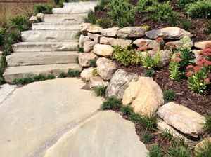 Our Natural Stone Hardscape service offers homeowners a beautiful and durable solution for their outdoor spaces, enhancing the aesthetic appeal and functionality of their landscapes. for Vivid Color Landscapes, LLC in Woodstock, GA