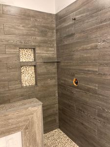 Our Custom Showers and Tile work service offers the option to have a personalized, aesthetically pleasing shower space created with expert tile installation for their construction or remodeling needs. for Third Gen Construction LLC  in Cortland, NY