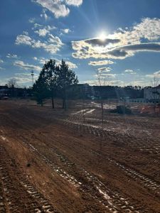 Our leveling service expertly prepares your land for construction by ensuring a stable, even surface. We enhance the structural integrity of your project while preventing drainage issues and optimizing property aesthetics. for CST Dirt Solutions in Rowan, NC