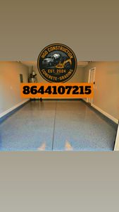 Our epoxy flooring installation service transforms your home's surfaces into durable, sleek, and easy-to-clean spaces. Ideal for garages and basements, our expert team ensures a flawless finish tailored to your needs. for HGO Construction & Grading LLC in Spartanburg, SC