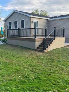 Our decking service offers expert installation and repair of outdoor deck structures to enhance your home's beauty and functionality, creating the perfect space for relaxation and entertainment in your backyard. for MRC Construction  in Dundee, NY