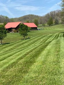 Our mowing service is the perfect way to keep your lawn looking neat and tidy. We will take care of everything, from trimming the edges to disposing of the clippings. You can rest assured that your lawn will be in good hands with our experienced professionals. for Dust Till Dawn Lawn in London, Kentucky