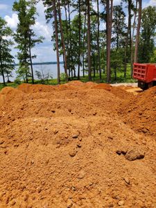 Our Fill Dirt service provides homeowners with high-quality soil that can be used for leveling the ground, filling holes, or creating new landscapes on their property. for Patriot Sand & Gravel in Mount Vernon, Texas