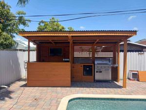 Our Bar Deck or Patio service offers homeowners a seamless and stylish outdoor entertaining space, enhancing the functionality and aesthetics of their backyard with our expert construction and design expertise. for WOOD BAR  DESIGN in Fort Lauderdale, FL