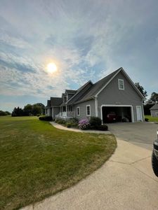 Our Drive and Sidewalk service is a great way to clean your driveway and sidewalks without having to do the hard work yourself! Our experienced pressure washers will take care of everything for you in just a few hours, so you can relax and enjoy your clean driveway and sidewalks. for A&E Pressure Washing & Roof Cleaning LLC in Owosso, MI