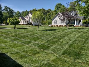 Our Lawn Care service offers comprehensive maintenance, including mowing, trimming, weed control, and fertilization to ensure a healthy and vibrant lawn for your home. for Kerr’s Lawn Care in Salisbury, NC