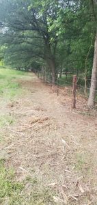 Our Custom Ranch Fencing service offers tailored solutions for homeowners, providing durable and stylish fences that enhance security and blend seamlessly with the surrounding landscape. for Rudy's Custom Fence Building in Luling, TX