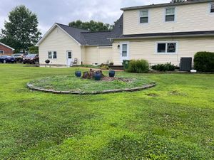 Transform your outdoor space with our expert Patio Design & Construction services, creating a beautiful and functional area for relaxation and entertainment, customized to enhance the aesthetics of your home. for New Outlook Lawncare in Henderson County, KY