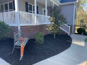 Enhance your landscape with our professional mulch installation service, designed to retain soil moisture, suppress weeds, and add aesthetic appeal to your garden while promoting healthier plant growth. for San-Lee Lawncare & Fencing in Sanford, NC