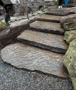 Enhance your outdoor space with our Natural Stone Hardscape service, offering timeless beauty and durability. We expertly design and install patios, pathways, and retaining walls tailored to elevate your home's landscape. for Vandermeer Stone and Excavation in Wayne County, PA