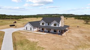 Our Custom Homes service offers homeowners the opportunity to create and customize their dream homes, ensuring unique design elements and personalized features that suit their lifestyle. for Who Can Construction in Stephenville, TX