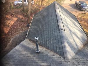 Our Roof Cleaning Service safely and effectively cleans roofs using a low-pressure cleaning system and detergent that will remove all the black streaks, moss, and lichen. for DDG House Wash in Charlotte, NC