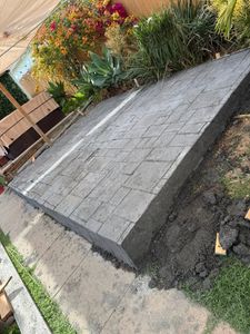 Transform your outdoor spaces with our expert stamped concrete installation service. We deliver durability, beauty, and custom designs that seamlessly complement your home's aesthetic while enhancing curb appeal and value. for Nito's Concrete Pumping in Chula Vista, CA