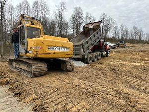 Our Driveway Construction service offers homeowners professional and efficient solutions to clear land, prepare the area, and build durable driveways tailored to their specific needs. for Tom Patterson & Son General Contracting LLC in Uniontown,  PA