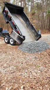 Driveways undergo lots of wear and tear from vehicles and extreme weather. We can not only resurface your drive but also help design an entirely new look to spruce up your home appearance. We use Slag which holds, Lasts, and looks better than crusher run and asphalt milling. However, we offer those products as well. for Muddy Paws Landscaping in Elgin, SC