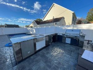 Transform your backyard with our expert Outdoor Kitchen Construction service. We create custom, high-quality spaces perfect for cooking and entertaining, enhancing both functionality and aesthetic appeal in your outdoor area. for Elite Kitchens and Bath in Freeport, NY