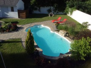 Transform your backyard with our expert swimming pool construction and remodeling services, offering custom designs, high-quality materials, and precise craftsmanship to create a stunning oasis tailored to your home. for Doyle & Sons LLC in Quincy, MA