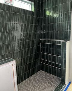 Our Tile Shower service offers professional installation and renovation expertise to homeowners, ensuring an aesthetically pleasing and functional shower space with durable tile finishes. for Premier Tile Contractors LLC in Henrico, Virginia