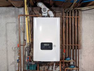 Experience endless hot water and energy efficiency with our professional tankless water heater installation. Our expert plumbers ensure seamless integration, delivering reliable service and enhanced convenience for your home's needs. for Harvey's Drain Solutions in Alexandria, KY