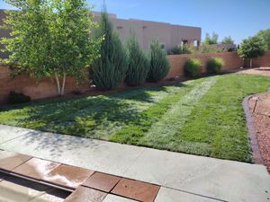 Our Lawn Maintenance service provides homeowners with regular upkeep and care for their lawns, ensuring a lush and healthy outdoor space all year round. for 2 Brothers Landscaping in Albuquerque, NM