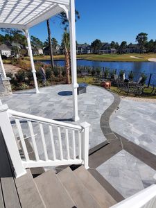 Our Paver & Stone Patio service combines skilled construction expertise with high-quality materials to create beautiful outdoor spaces for homeowners to enjoy and relax in. for Bianchi Construction Company Inc in Southport, NC