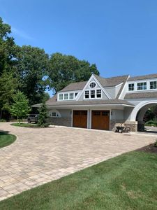 Our concrete cleaning service is the perfect way to get your concrete looking new again! We use high pressure water to clean the surface of your concrete, and then we use a special detergent to remove any built-up dirt or grime. for Unlimited Softwash in Bellingham, MA