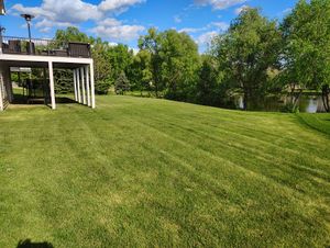 Our professional mowing service ensures your lawn looks immaculate, promoting healthy grass growth and enhancing curb appeal with precision trimming and expert care tailored to fit the unique needs of your yard. for Big River lawn Care services and snow LLC in Wausau, WI