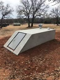 Our Storm Shelters service offers protective underground structures designed to keep you and your family safe during severe weather events, providing peace of mind for homeowners. for Winding Creek Construction & Landscaping in Mcloud, OK