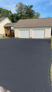 Contact us to seal your driveway to enhance the longevity and appearance of your driveway for Cloonan's Home Improvement LLC in Ghent, WV