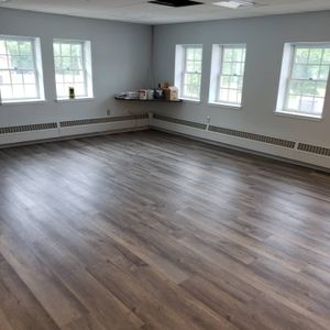 Our expert floor installation service ensures a flawless finish for your home with premium Luxury Vinyl Plank (LVP), offering durability, style, and comfort to enhance any living space with elegance. for Josh McLoone's Flooring in Whitman, MA