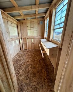 Our Chicken Coop Construction service offers homeowners a custom-built coop for their feathered friends, providing a safe and comfortable space that blends seamlessly with your property's aesthetics. for The Shed Family & Farm LLC in Albany, NY