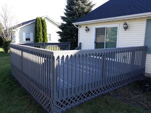 Enhance your deck's beauty and longevity with our expert painting and staining services. Our team ensures a flawless finish that not only protects but also revitalizes your outdoor space. for Risner Construction in De Motte, IN