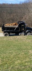 Our Trucking service offers efficient transportation solutions for homeowners, ensuring timely removal and delivery of materials during land clearing projects to simplify the process. for Tom Patterson & Son General Contracting LLC in Uniontown,  PA