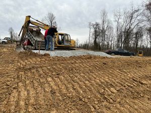 Our Driveway Construction service offers homeowners professional and efficient solutions to clear land, prepare the area, and build durable driveways tailored to their specific needs. for Tom Patterson & Son General Contracting LLC in Uniontown,  PA