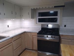 Transform your cooking space with our Kitchen Renovation service. We offer customized designs, quality materials, and expert installation to bring your dream kitchen to life! We specialize in farmhouse style kitchens.  for Down Home Contracting in New Castle, PA