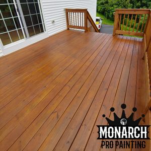 Our Deck Refinishing service specializes in restoring the beauty and lifespan of your deck by expertly staining and sealing it, ensuring long-lasting protection against weather damage. for Monarch Pro Painting, LLC in Hampton, NH